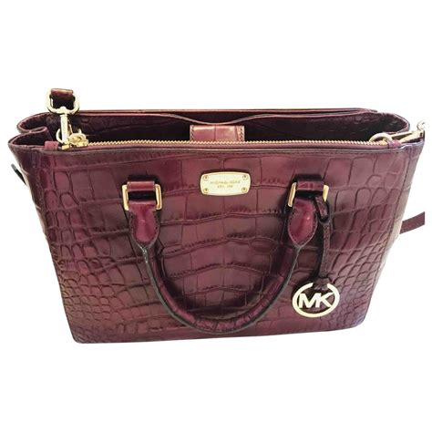 Amazon.com: Burgundy Michael Kors Handbags.